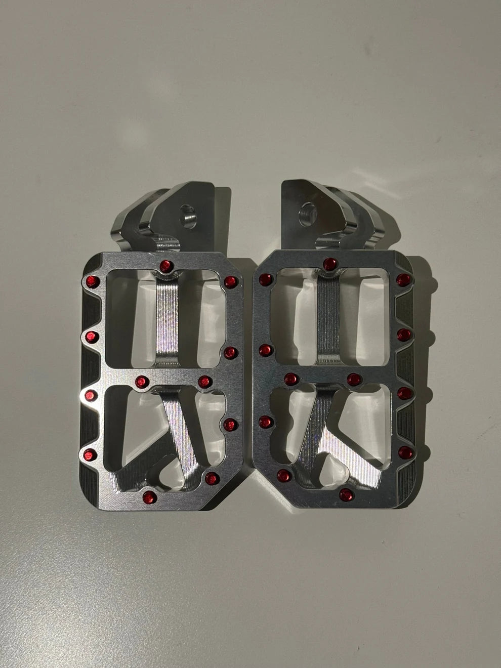 Surron chrome pegs