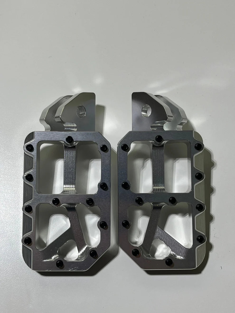 Surron chrome pegs