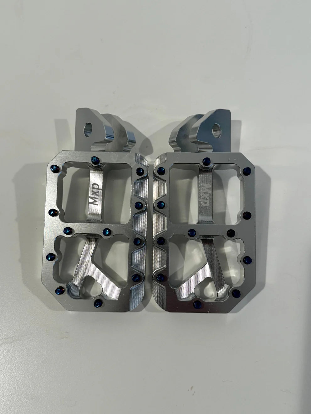 Surron chrome pegs