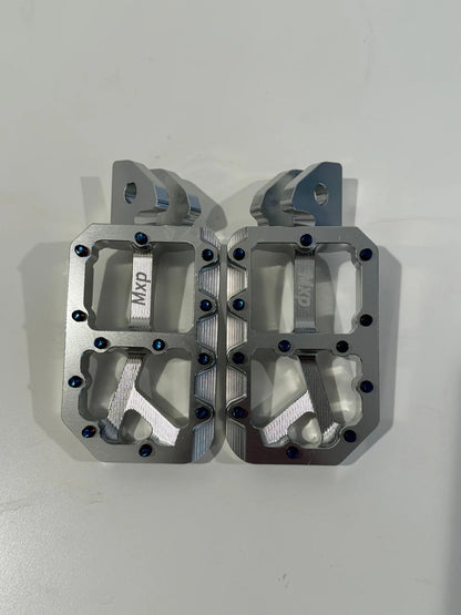 Surron chrome pegs