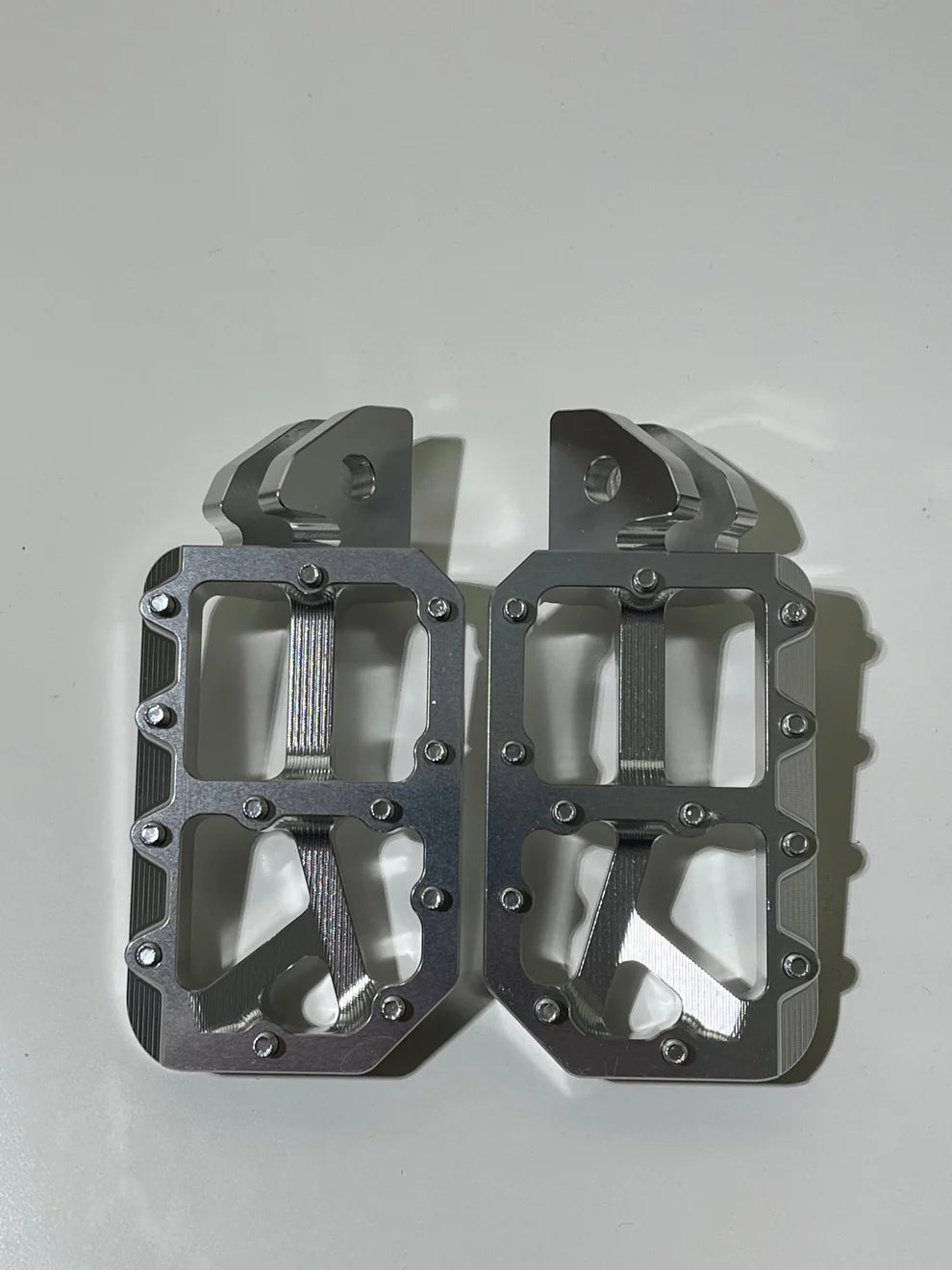 Surron chrome pegs